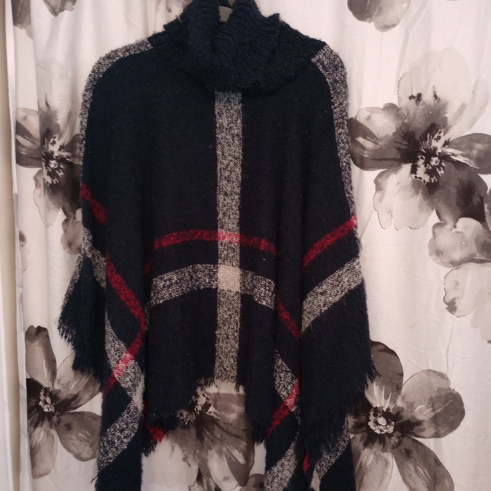 NWOT. Your favorite cowl neck cozy bat wing Poncho.